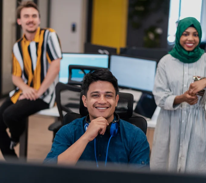 multiethnic startup business team woman wearing hijab meeting modern open plan office interior brainstorming working laptop desktop computer selective focus high quality photo 1